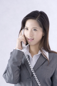 职业女性穿着职业装打电话的女性图片图片